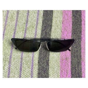 Prada // Black SPR 64U Ultravox Cateye Sunglasses